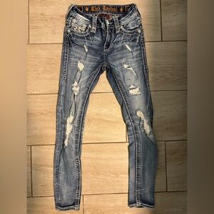Distressed Blue Jeans